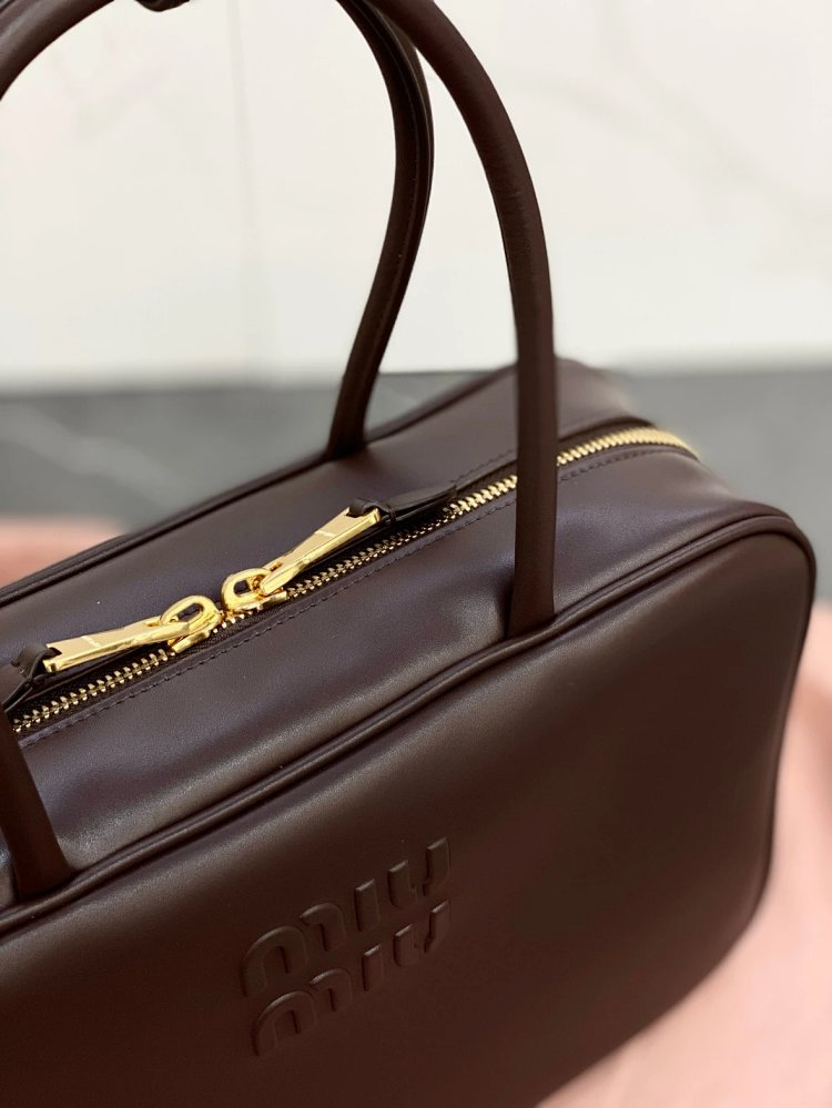 miumiu Original Leather Handheld Official Document Bag for Women 2025 New Large Capacity Retro Under